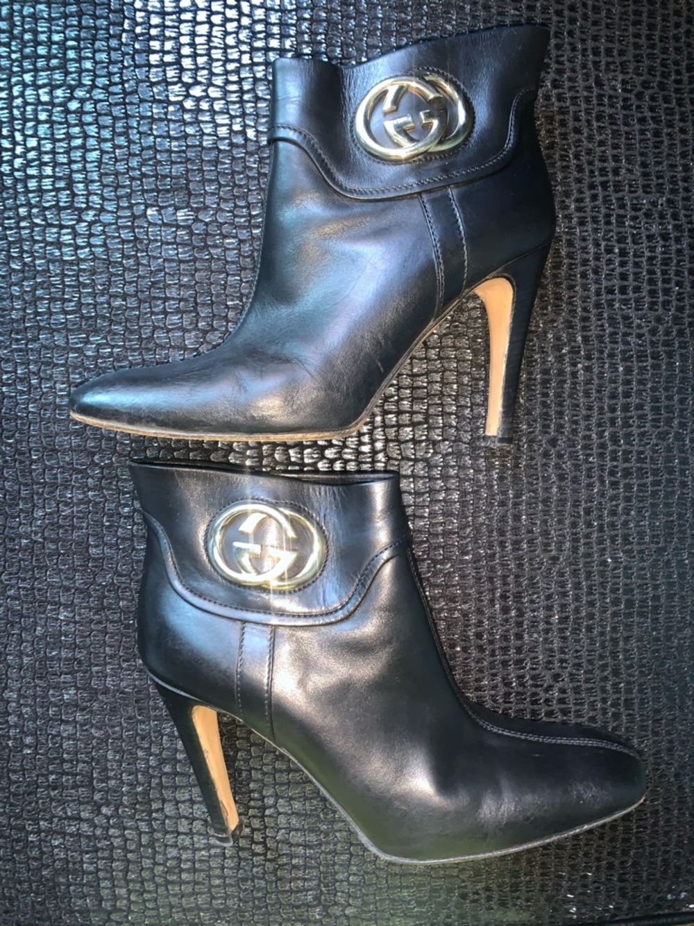 Gucci Black Leather High-Heel Ankle Boots with Gold Emblem